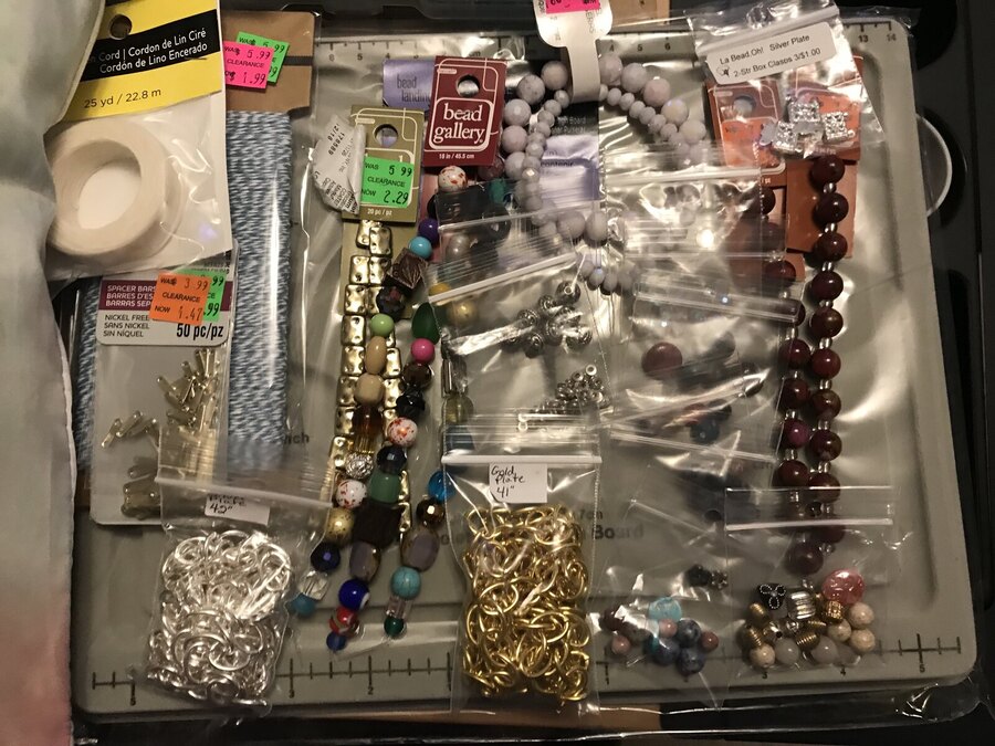 Trays and drawers of glass beads and findings