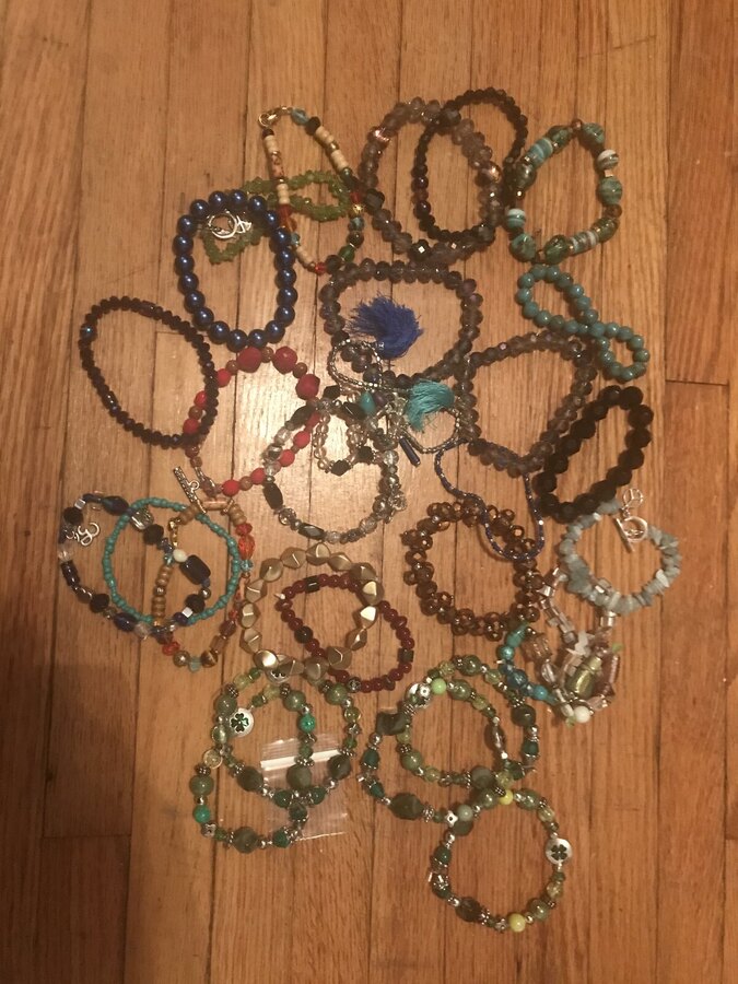 A run of finished bracelets laid out together